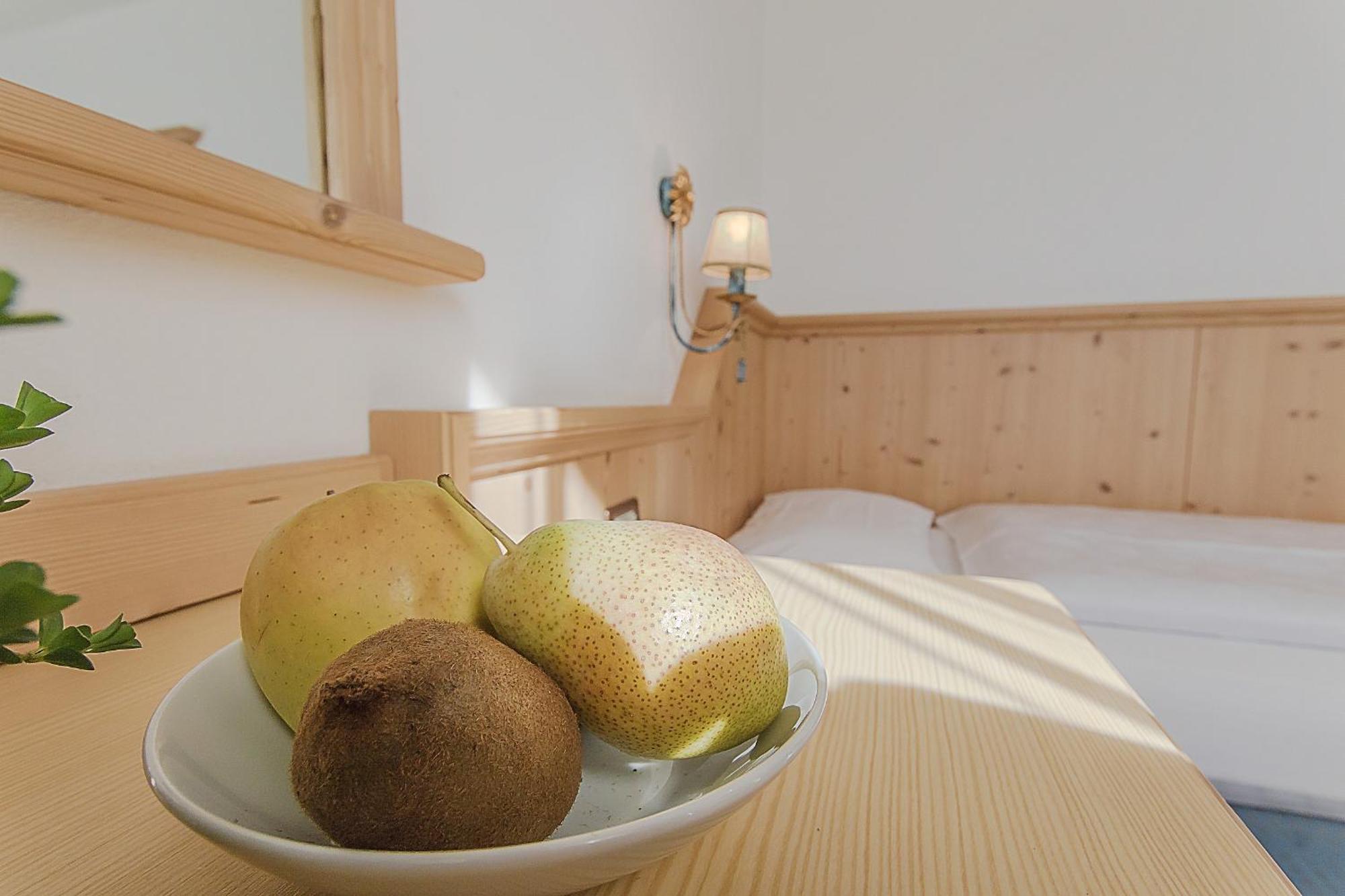 Garni La Dorada Lejlighedshotel Colfosco Værelse billede